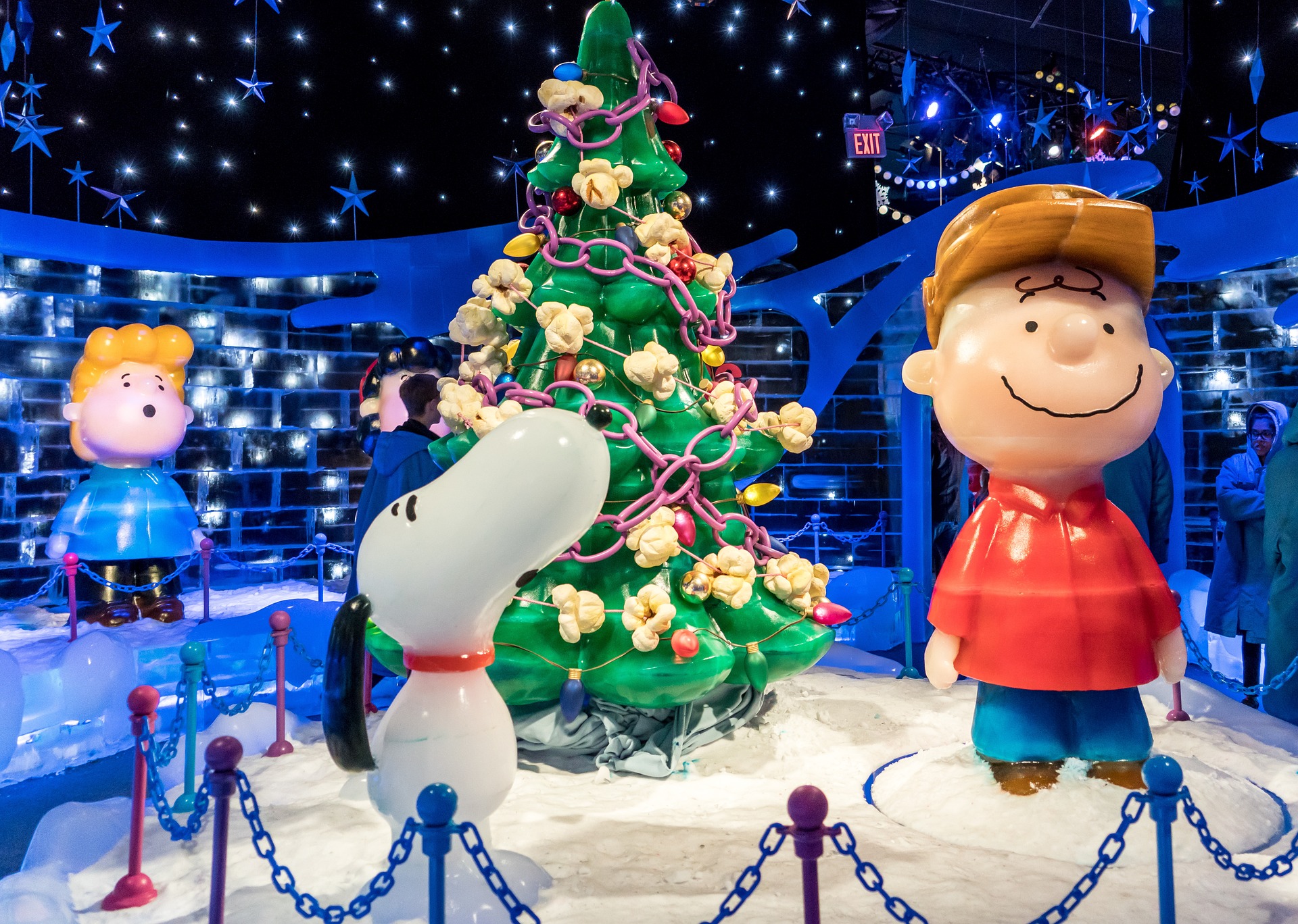 Ice sculpture of Charlie Brown, Snoopy, and big Christmas Tree